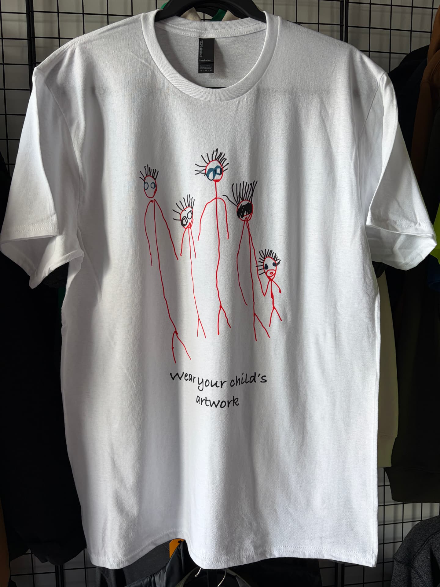 Custom printed t-shirt featuring a child's artwork by Dava X